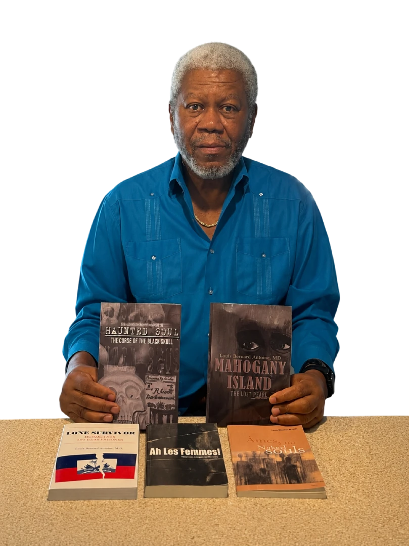Dr. Louis Bernard Antoine with his published books